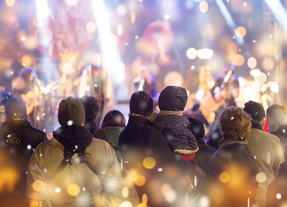 Concert crowd. Winter family event background